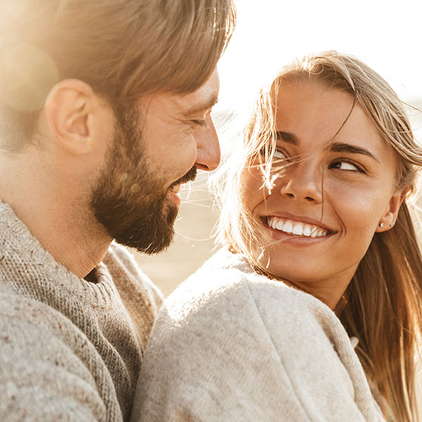 3D Imaging Couple Smiling Outdoors