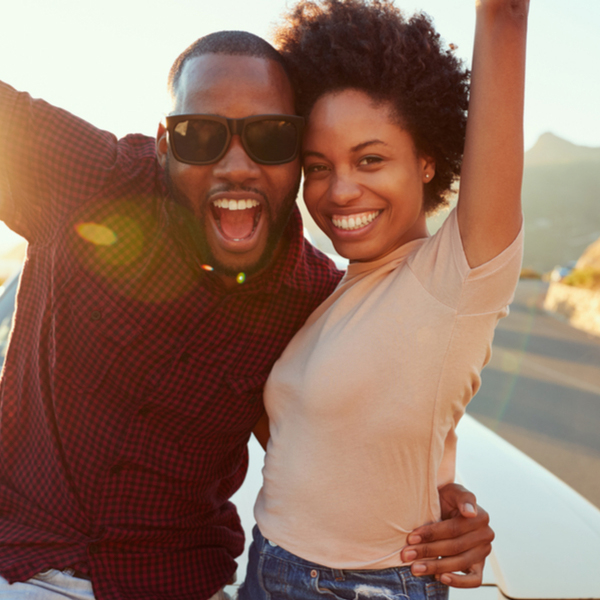 Young Couple Outdoors with Sunglasses