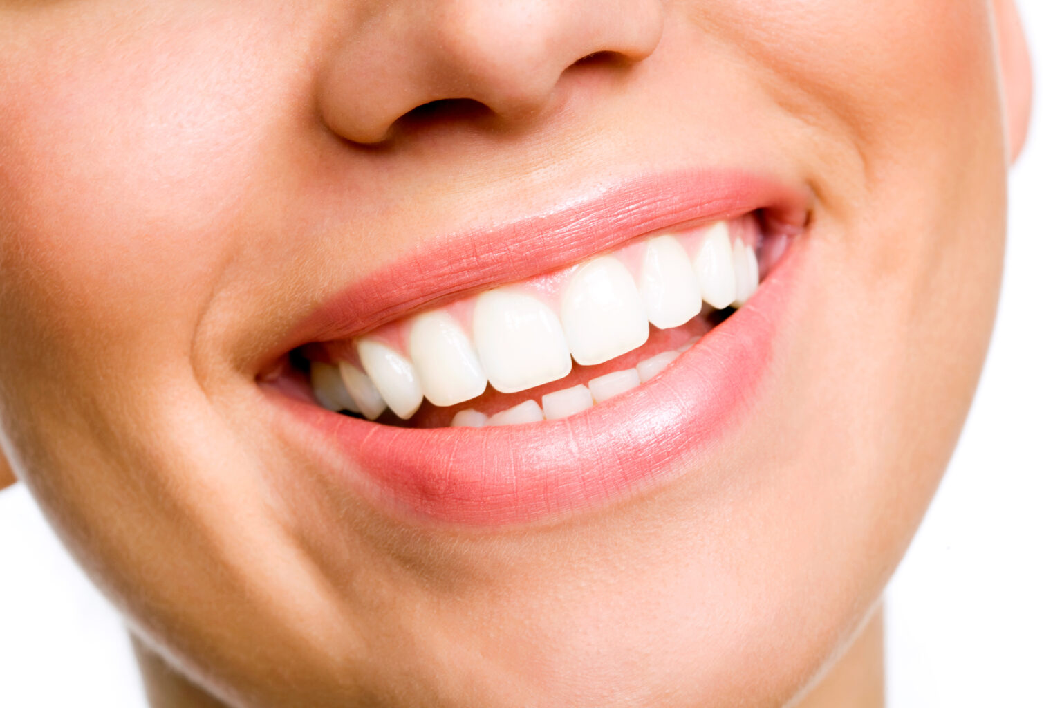 Close-up of a person's smile, showing healthy teeth thanks to affordable Dallas dentist care.
